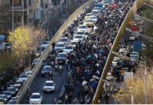 Iranian protesters clash with security forces as tear gas fills Tehran streets amid nationwide unrest